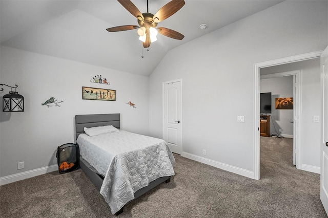 carpeted bedroom featuring vaulted ceiling and ceiling fan