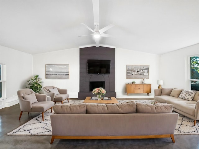 living room featuring a brick fireplace, vaulted ceiling, and ceiling fan