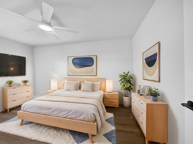 bedroom featuring dark hardwood / wood-style floors and ceiling fan