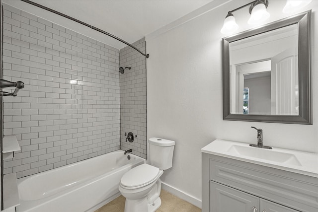 full bathroom with vanity, toilet, and tiled shower / bath