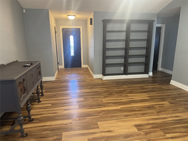 entryway with wood-type flooring