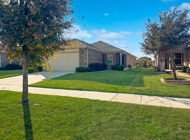 view of front of property featuring a garage and a front yard