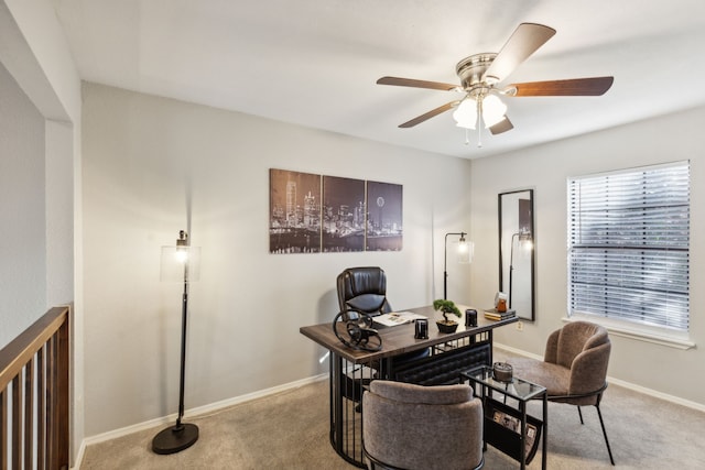 office area with light carpet and ceiling fan