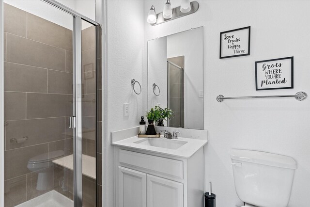 1307 Wheelwright Dr, Forney, TX 75126 - bathroom featuring vanity and a shower stall