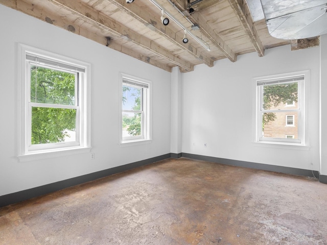 329 E Colorado Blvd Unit 202, Dallas, TX 75203 - empty room with concrete flooring and baseboards