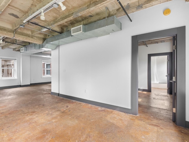329 E Colorado Blvd Unit 202, Dallas, TX 75203 - below grade area with rail lighting, visible vents, and baseboards
