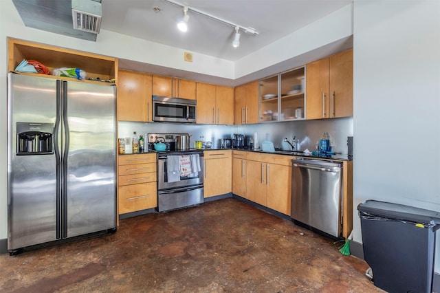 kitchen featuring appliances with stainless steel finishes and sink