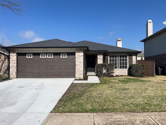 view of front of house featuring brick siding, a front lawn, roof with shingles, driveway, and an attached garage