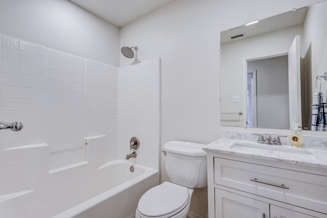 full bathroom featuring vanity, washtub / shower combination, and toilet