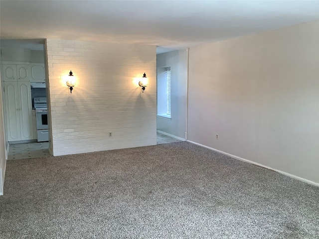 unfurnished room with light colored carpet