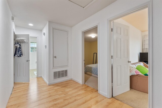 hallway featuring light hardwood / wood-style floors