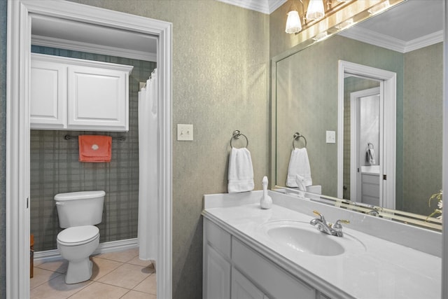 bathroom with tile patterned flooring, vanity, toilet, and ornamental molding