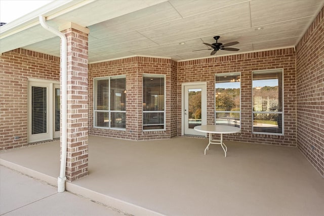 view of patio featuring ceiling fan