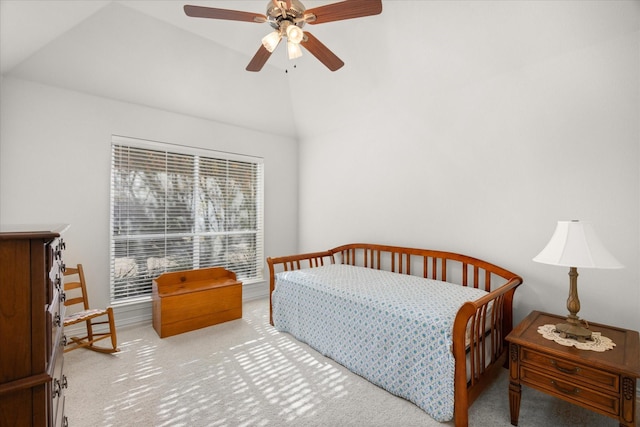 bedroom featuring light carpet, ceiling fan, and lofted ceiling