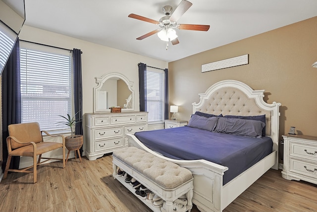 bedroom featuring ceiling fan and light hardwood / wood-style floors