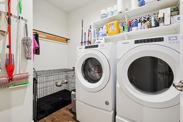 laundry area featuring washer and clothes dryer and dark hardwood / wood-style flooring