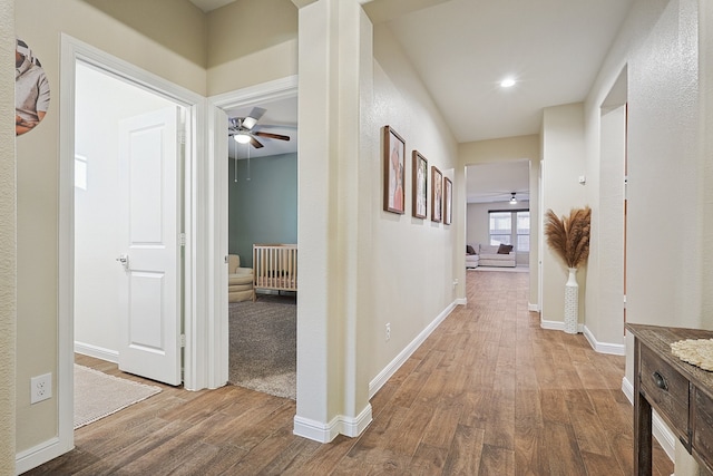 hallway featuring hardwood / wood-style floors