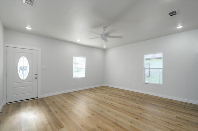 entryway featuring light hardwood / wood-style floors and ceiling fan