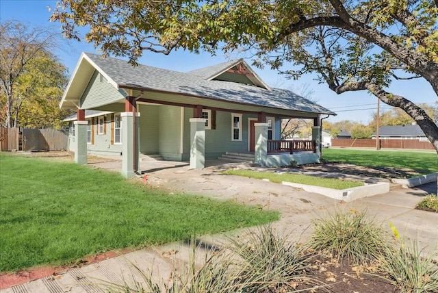 view of front of home featuring a porch and a front yard