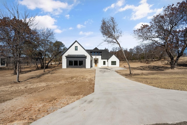 305 Glade Valley Rd, Azle, TX 76020 - modern farmhouse with concrete driveway and stucco siding