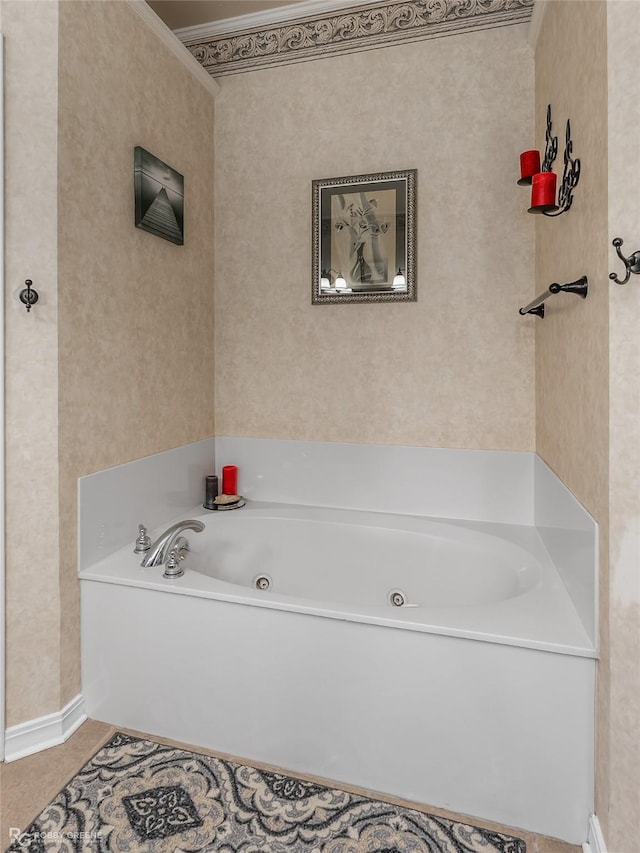 bathroom featuring tile patterned floors, a tub, and crown molding