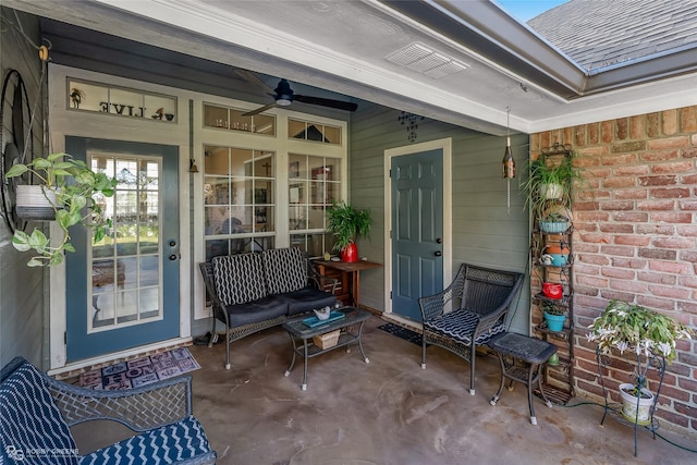 doorway to property with ceiling fan and covered porch