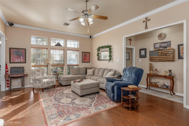 living room with ceiling fan, ornamental molding, and hardwood / wood-style flooring