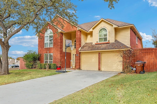 view of property featuring a front yard and a garage