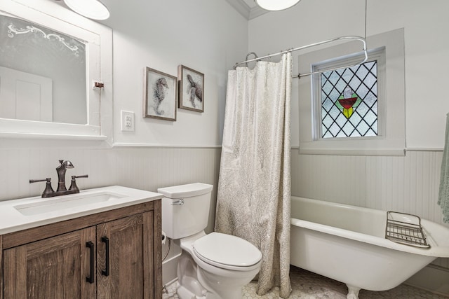 full bathroom with vanity, shower / bath combination with curtain, and toilet