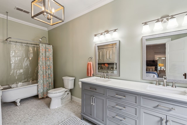 full bathroom with vanity, crown molding, toilet, a notable chandelier, and shower / tub combo