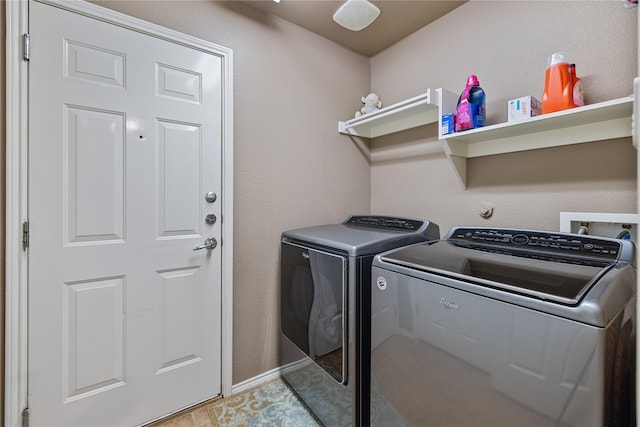 laundry area featuring washing machine and dryer