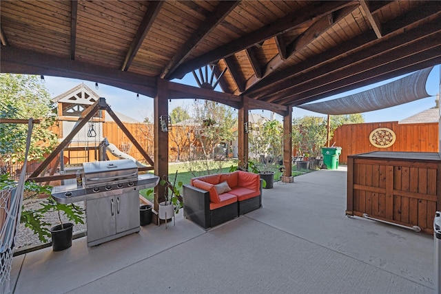 view of patio featuring a gazebo, area for grilling, an outdoor hangout area, and a playground