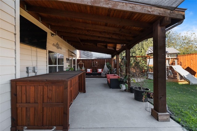 view of patio with a playground