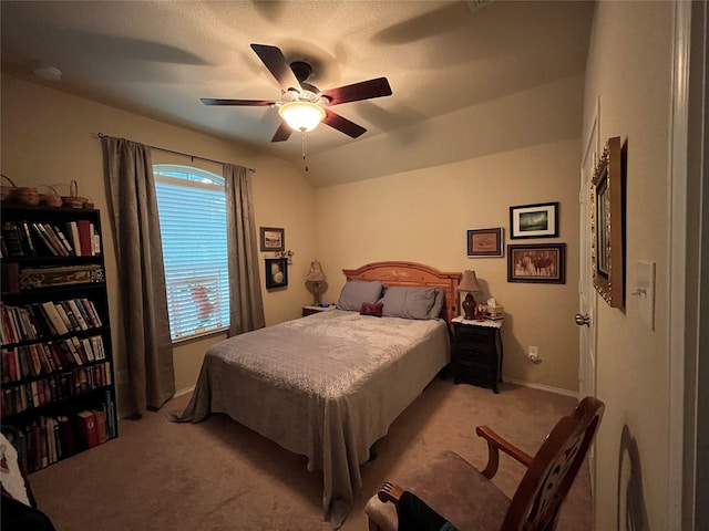 bedroom featuring ceiling fan and light colored carpet