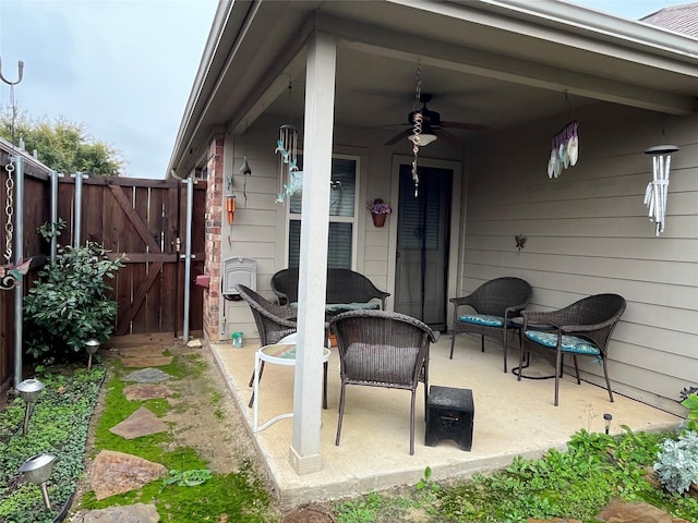 view of patio featuring ceiling fan