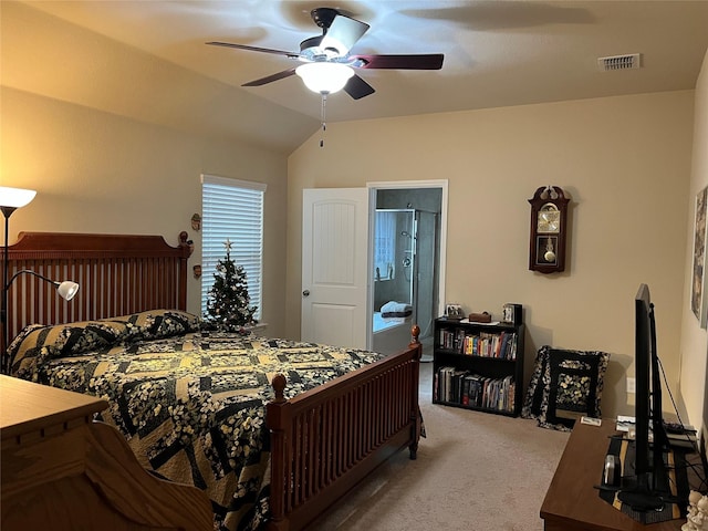 carpeted bedroom featuring ceiling fan and vaulted ceiling