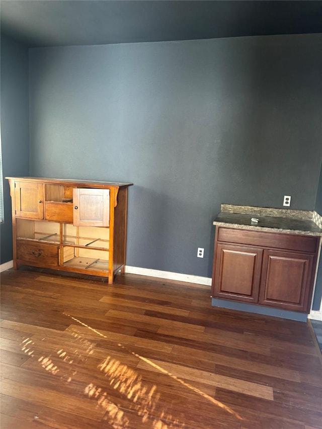 interior space with dark hardwood / wood-style flooring