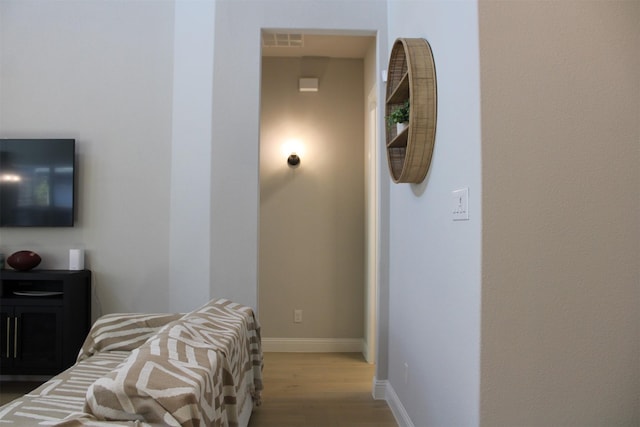 bedroom with light hardwood / wood-style flooring