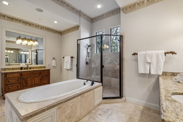 bathroom with vanity and separate shower and tub