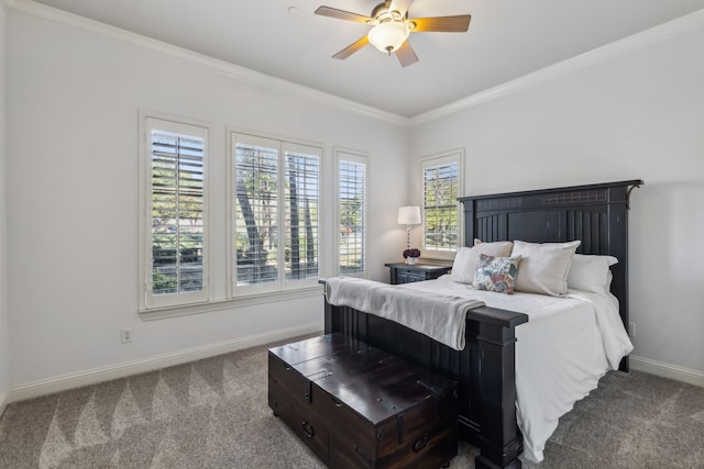 bedroom with carpet flooring, ceiling fan, and crown molding