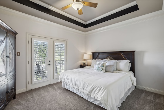 carpeted bedroom with access to exterior, french doors, a raised ceiling, ceiling fan, and crown molding