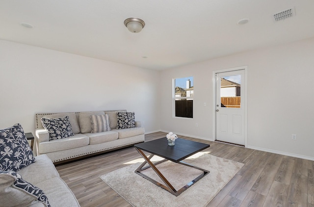 living room featuring light hardwood / wood-style floors