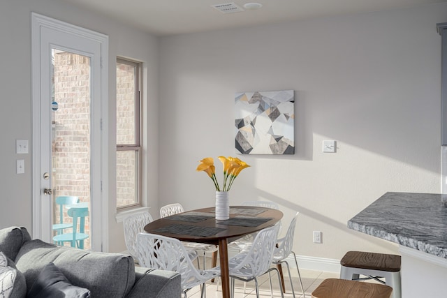 view of tiled dining area