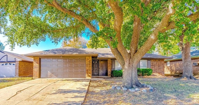 single story home featuring a garage