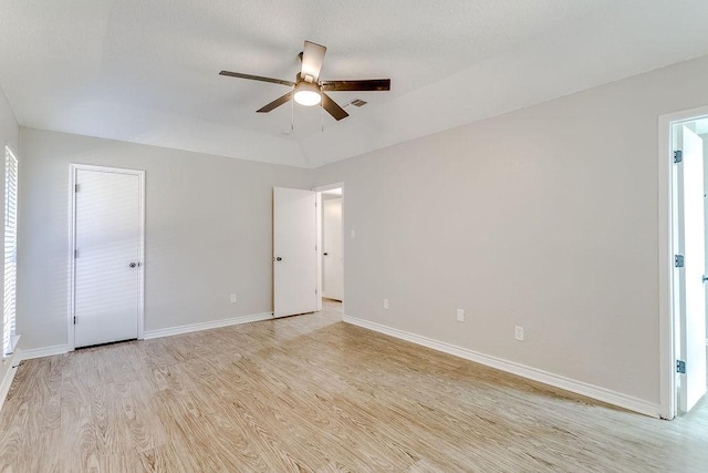 spare room with ceiling fan and light hardwood / wood-style flooring