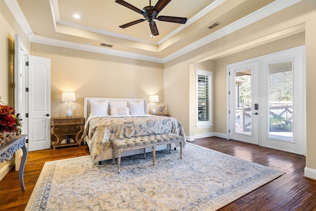 bedroom featuring french doors, dark hardwood / wood-style flooring, access to outside, and ceiling fan