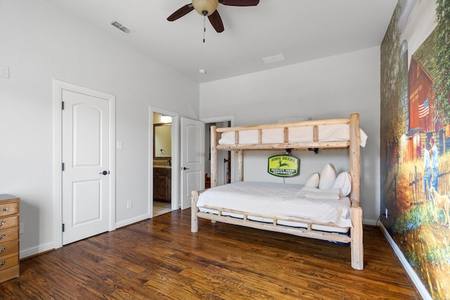 bedroom with dark hardwood / wood-style flooring, connected bathroom, and ceiling fan