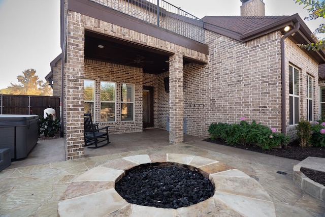 view of patio with an outdoor fire pit