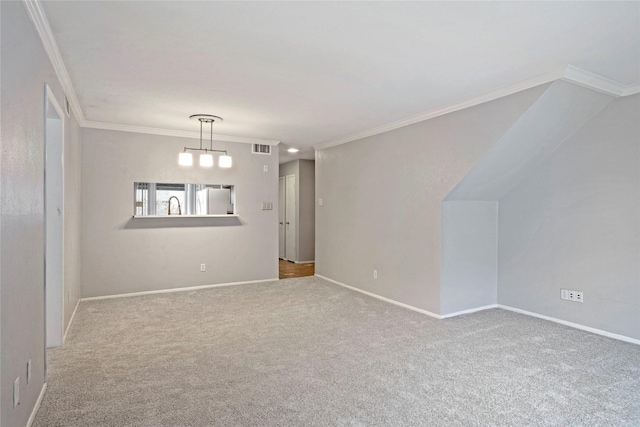 carpeted empty room with crown molding