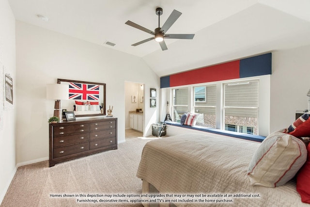 carpeted bedroom with ceiling fan, lofted ceiling, and connected bathroom